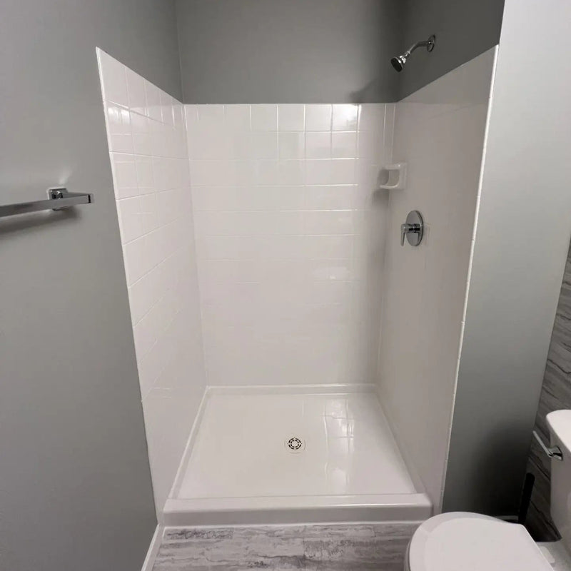 Entire unit or shower along with tile — after photo