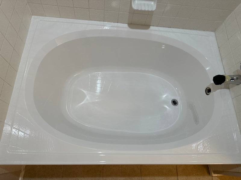 Large fiberglass bathtub reglazing — after photo